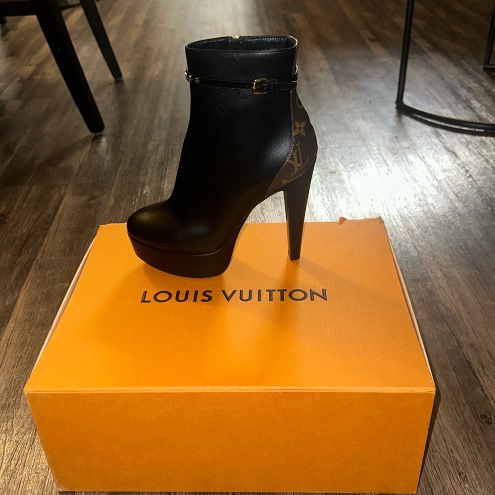 Authentic Louis Vuitton Heeled Booties . Never worn ! Came too small for me .